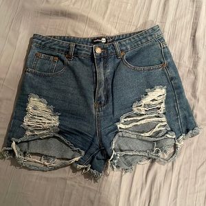 Size 6, Blue, High-waisted, Ripped Jean Shorts from Boohoo.